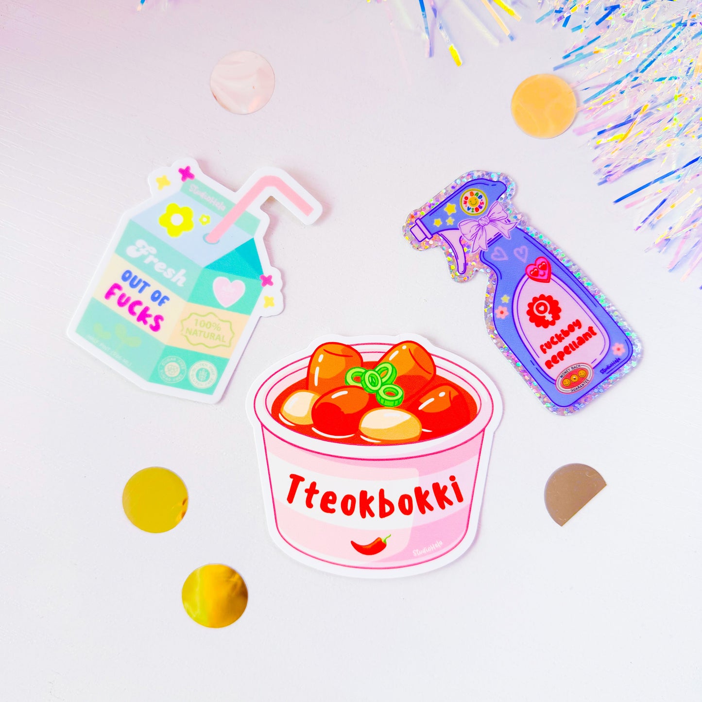 Colorful stickers on a white background with confetti