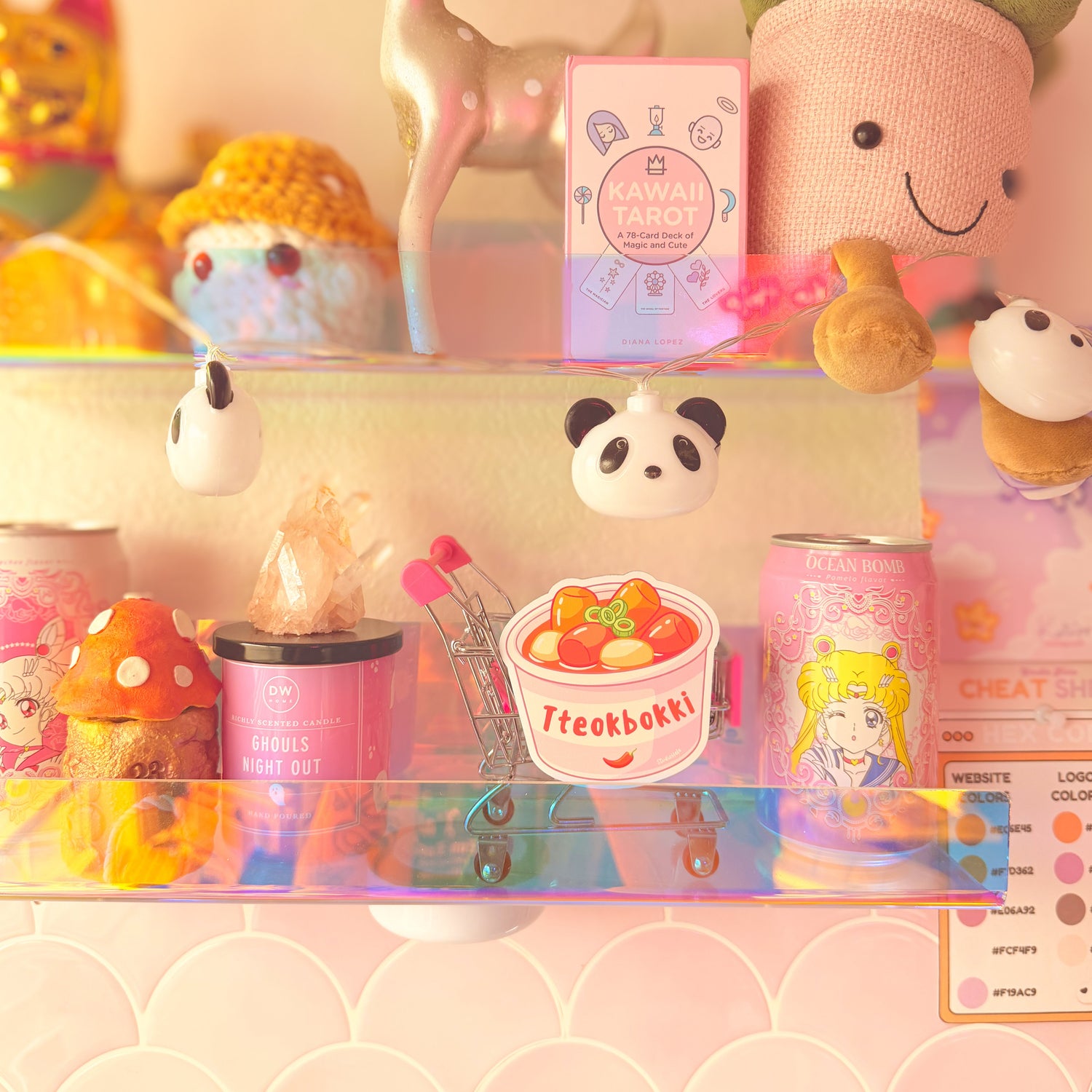 Colorful product display with cartoon-themed items on a pink background