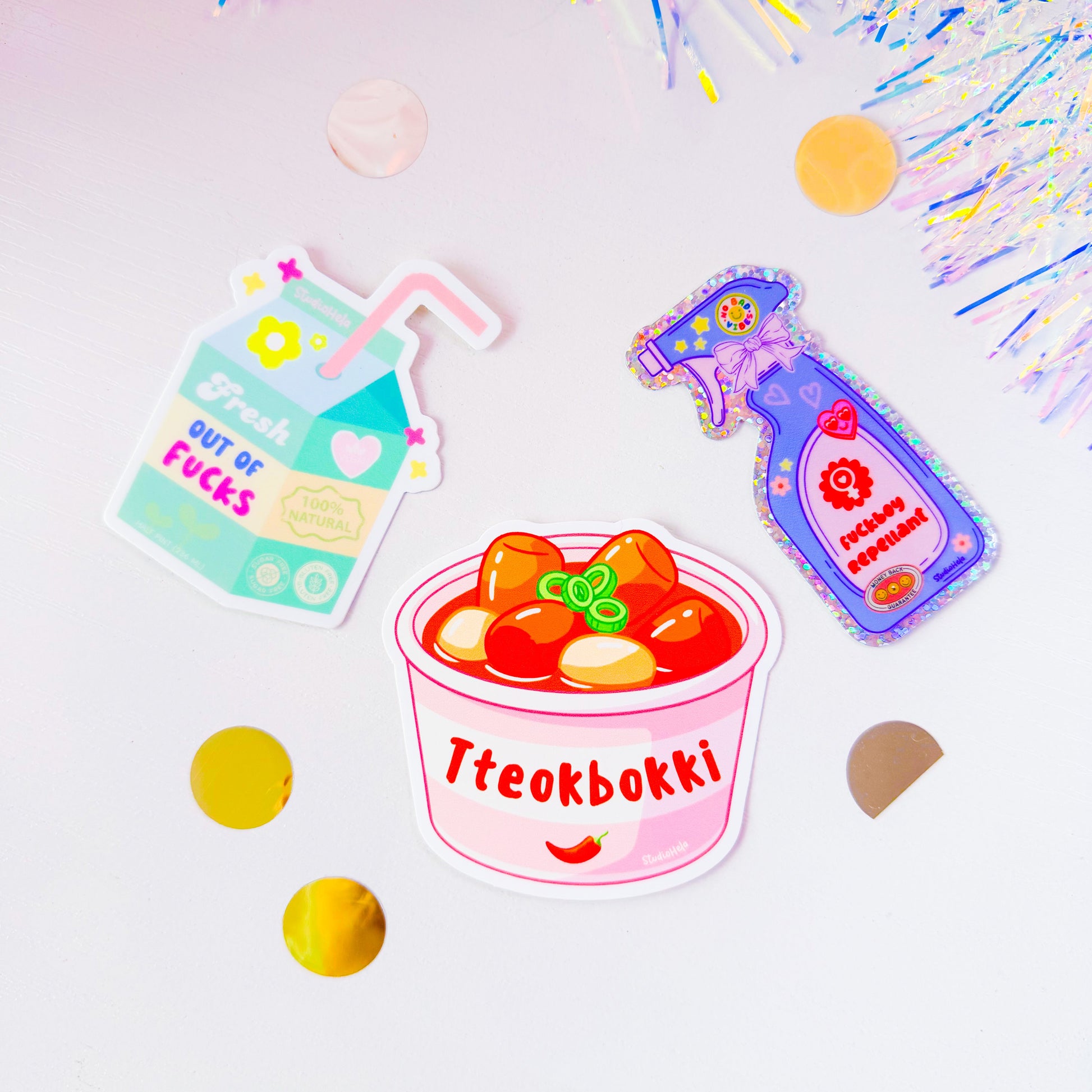 Colorful stickers on a white background with confetti