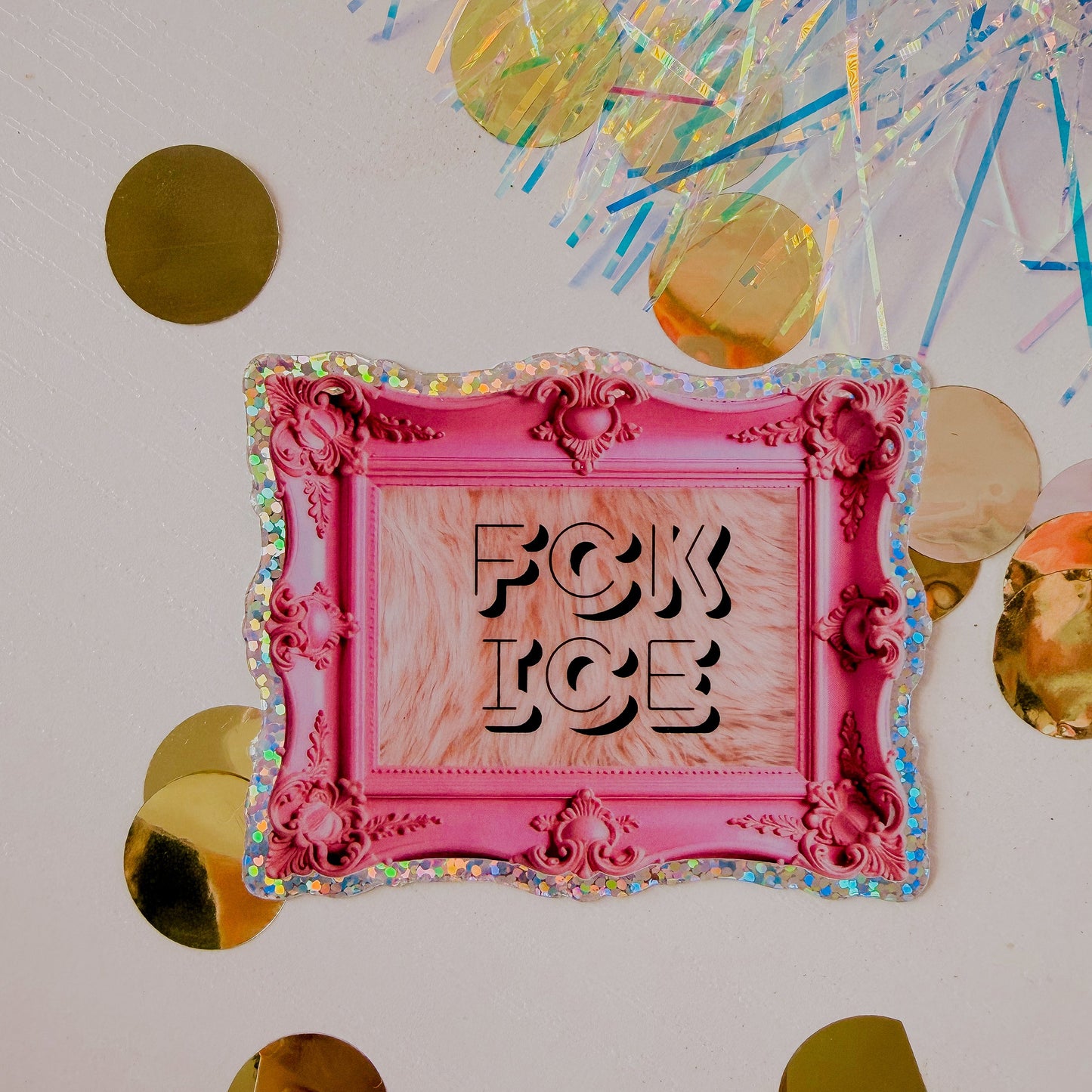 Pink decorative frame with 'F*CK ICE' text on a colorful confetti background
